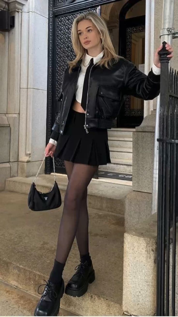 Leather Jacket and Pleated Skirt 